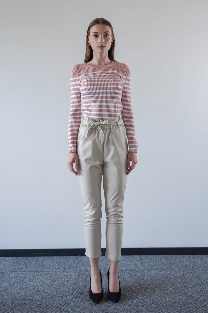 Trousers in vegan leather beige