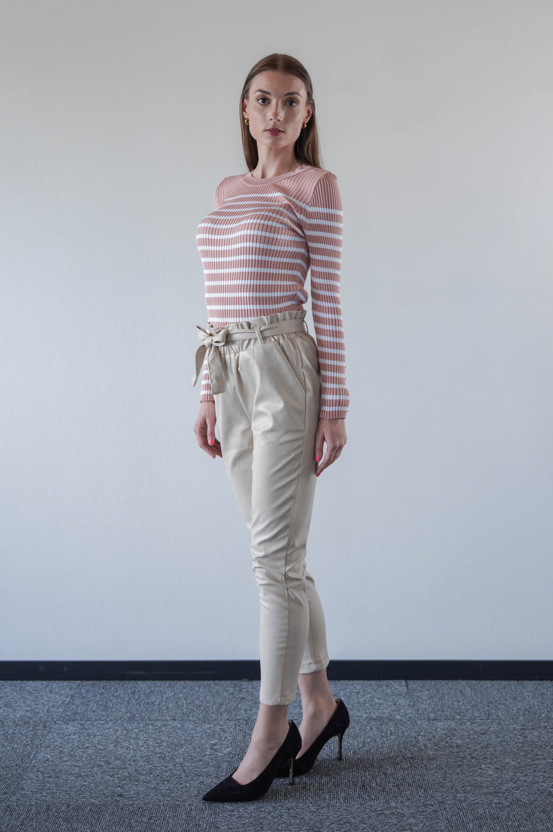 Trousers in vegan leather beige
